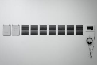 Installation views of a grid on a white wall