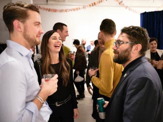 crowd of people chatting